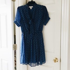 Vintage-style blue and white polka dot swing dress